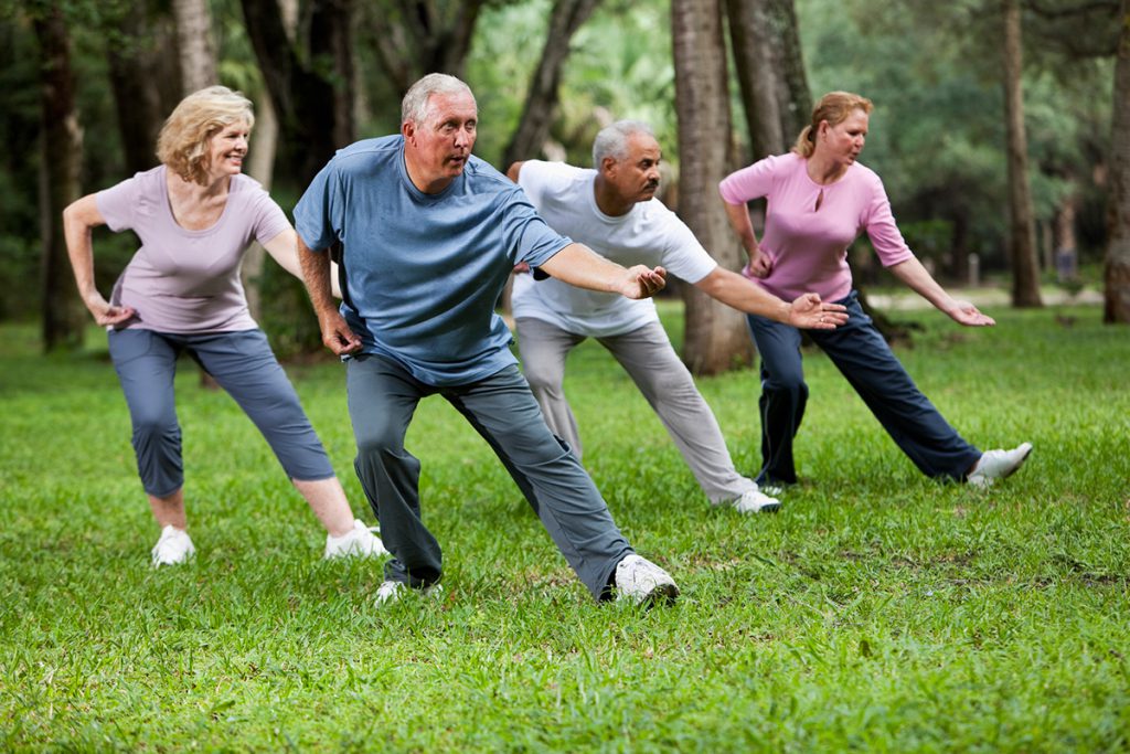 group of older adults doing tai chi for a story on ways tai chi relieves chronic pain