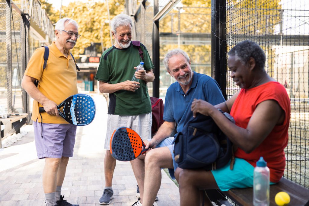 group of senior men meeting to play pickleball for a story on learning new things